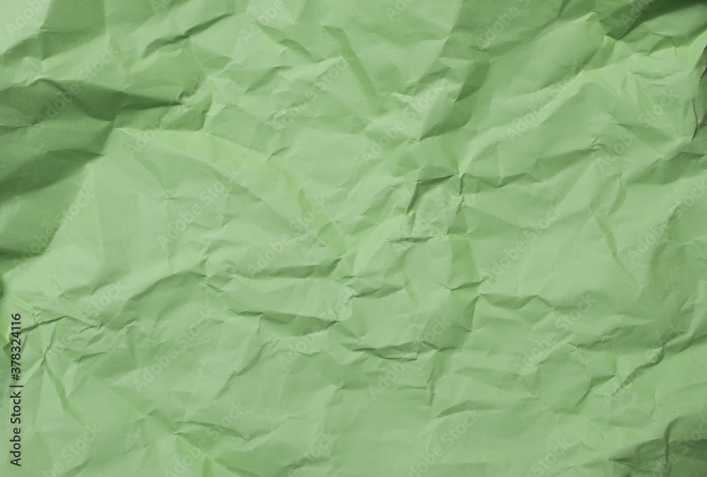 Fototapeta premium Crumpled green color background texture