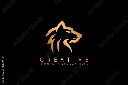 Wolf silhouette logo design isolated on black background. Vector illustration luxury gold Wolf logo