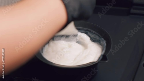 Mixing, preparation for hair coloring. Mixing bowl for paint. Beauty saloon.
