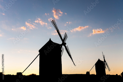 Silhouette of a traditional Spanish windmill near the village of Consuegra, Toiedo, Spain.