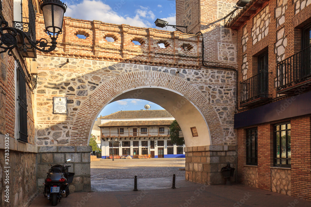 Consuegra, Toldeo, Spain: arch leading to the Plaza España; it is part of the town hall