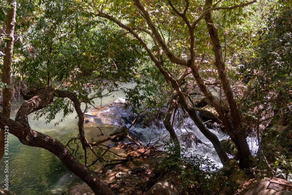 The bed of the swift mountainous Hermon River with crystal clear waters in the Golan Heights in northern Israel The bed of the swift mountainous Hermon River with crystal clear waters in the Golan Heights in northern Israel