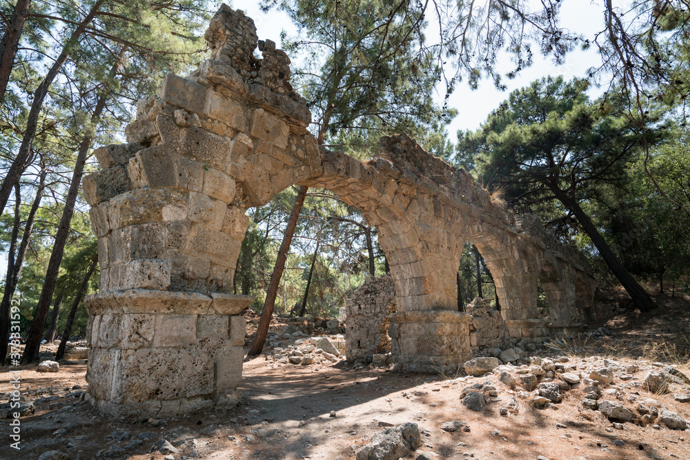 The ruins of the ancient aqueduct at Phaselis in Tekirova Kemer. Founded by the Rhodians in the VII Century. Phaselis is also an ancient port city. Antalya province TURKEY  