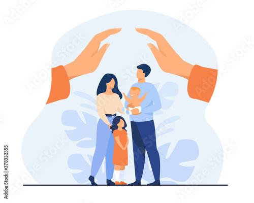 Hands protecting family with two children. Young couple of parents holding baby, standing together under human palms. For family safety, state protection, assistance, care concept