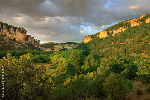 Cliffs of Serrania de Cuenca natural park  near the lake of U  a  in the province of Cuenca  Spain  in summer a green oasis in Central Spain
