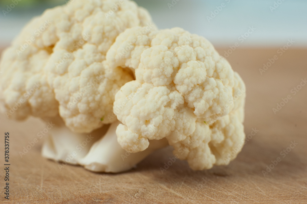 Cauliflower on a wooden Board. Macro photo. Selective focus. Cauliflower on a wooden Board. Macro photo. Selective focus.