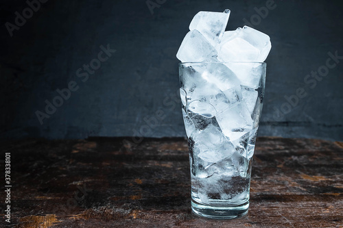 Ice in a glass on the table