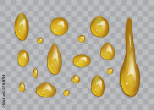 transparent drops of honey isolated on gray background 
