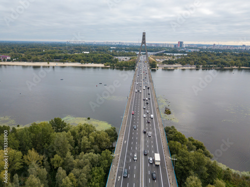 North bridge over the Dnieper river in Kiev. Aerial drone view.