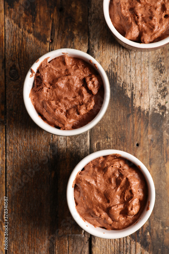 chocolate mousse on wood background