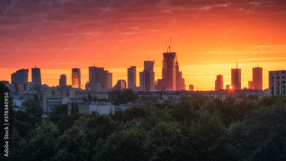 Panorama of skyscrapers in the center of Warsaw during sunrise, Poland