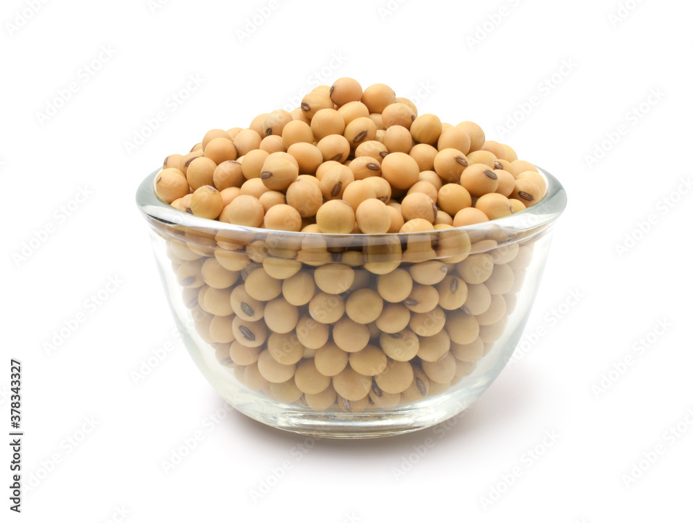 The soybeans in the glass bowl isolated on white background. The soybeans in the glass bowl isolated on white background.