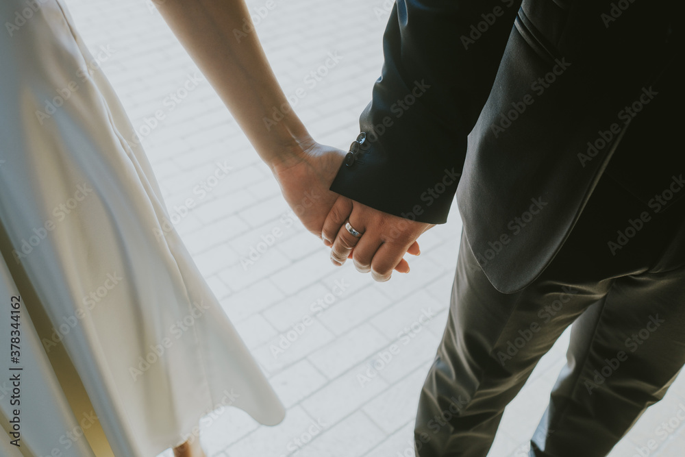 bride and groom holding hands bride and groom holding hands