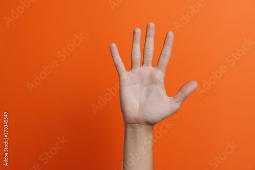 Woman's hand on an isolated background