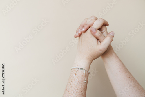 Woman's hands begging isolated over