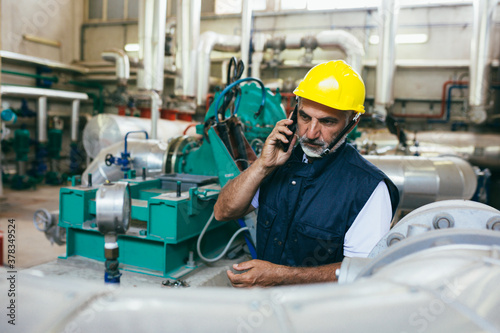 industry worker talking on mobile phone