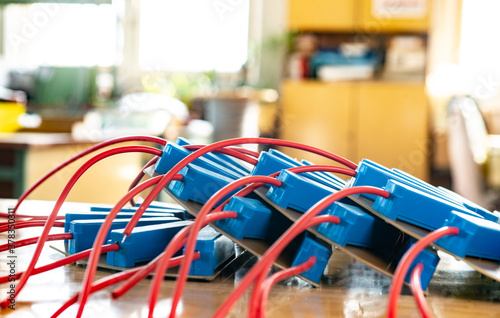 Close-up of a large green microcircuit with blue components