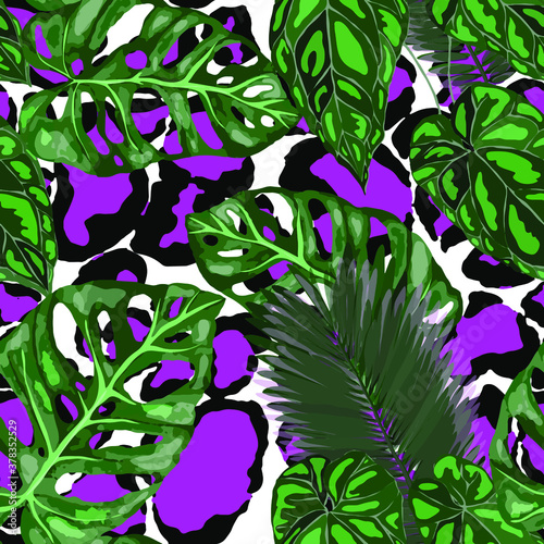 Tropical seamless pattern on animalistic texture. Jungle exotic summer print. Summer tropical leaf. Tropical flower fashion pattern. Floral tropic illustration. Vector seamless pattern.
