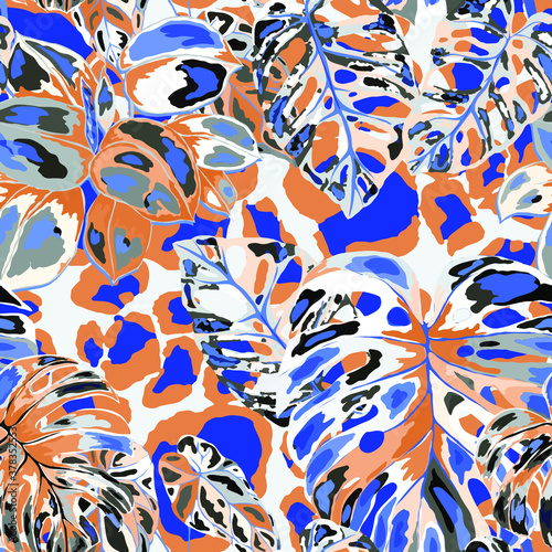 Tropical seamless pattern on animalistic texture. Jungle exotic summer print. Summer tropical leaf. Tropical flower fashion pattern. Floral tropic illustration. Vector seamless pattern.