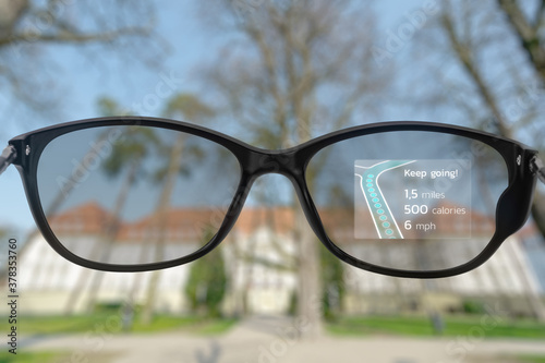 Running app showing on smart glasses' lens © yuriygolub