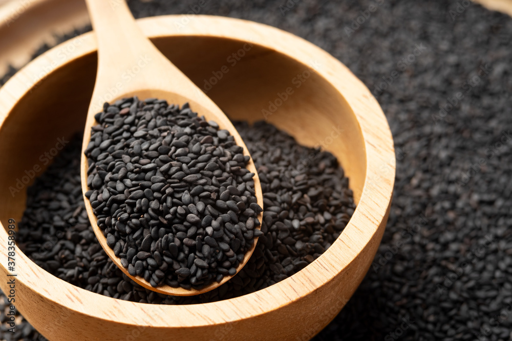 Close up black Sesame on spoon with copy space Close up black Sesame on spoon with copy space