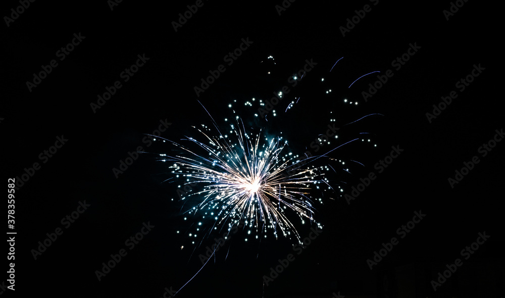 Beautiful display of fireworks on a dark sky on New Years Eve Beautiful display of fireworks on a dark sky on New Years Eve