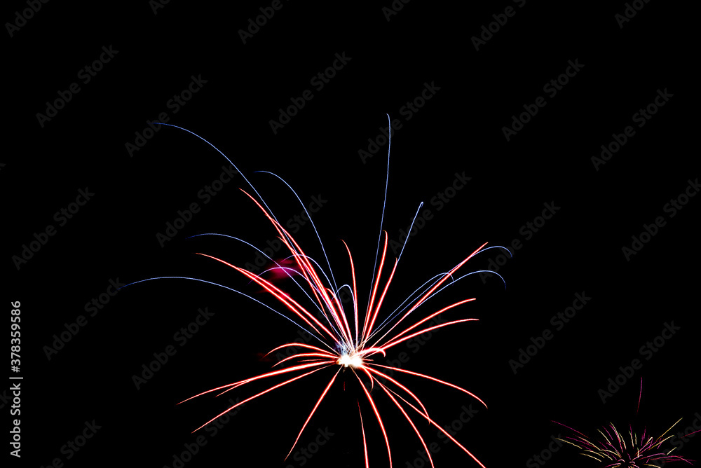Beautiful display of fireworks on a dark sky on New Years Eve Beautiful display of fireworks on a dark sky on New Years Eve