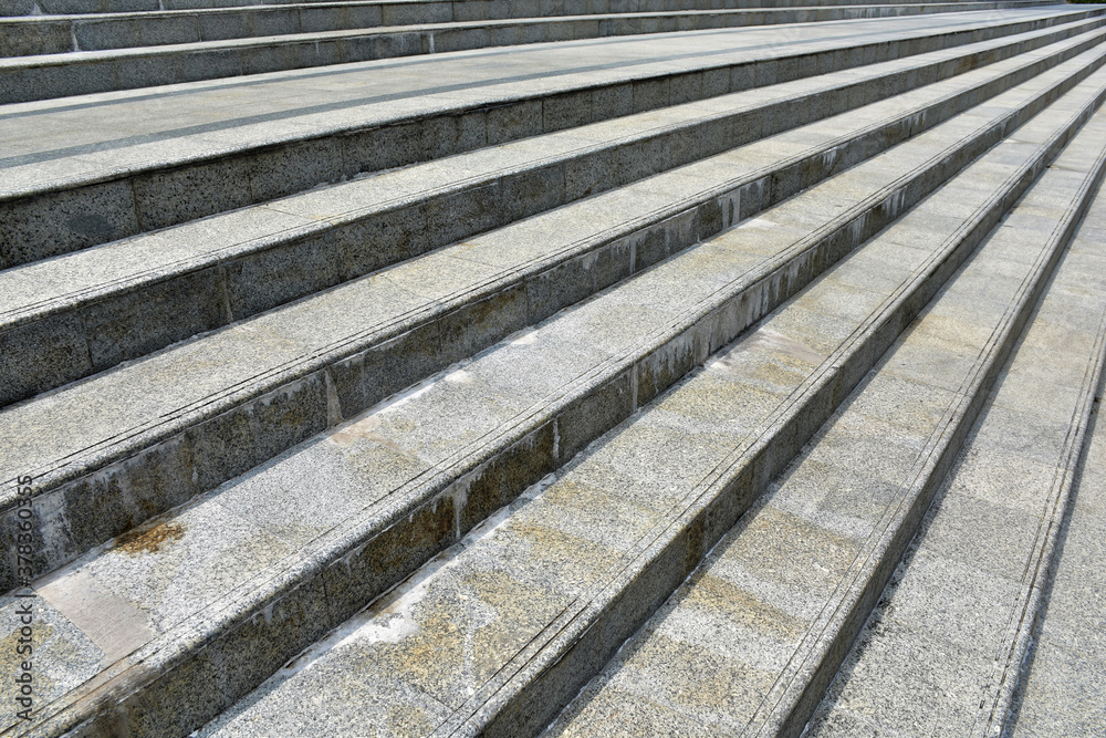 Modern architecture detail. Grunge texture of outdoor staircase. Step of rock stair with vintage style. Modern architecture detail. Grunge texture of outdoor staircase. Step of rock stair with vintage style.