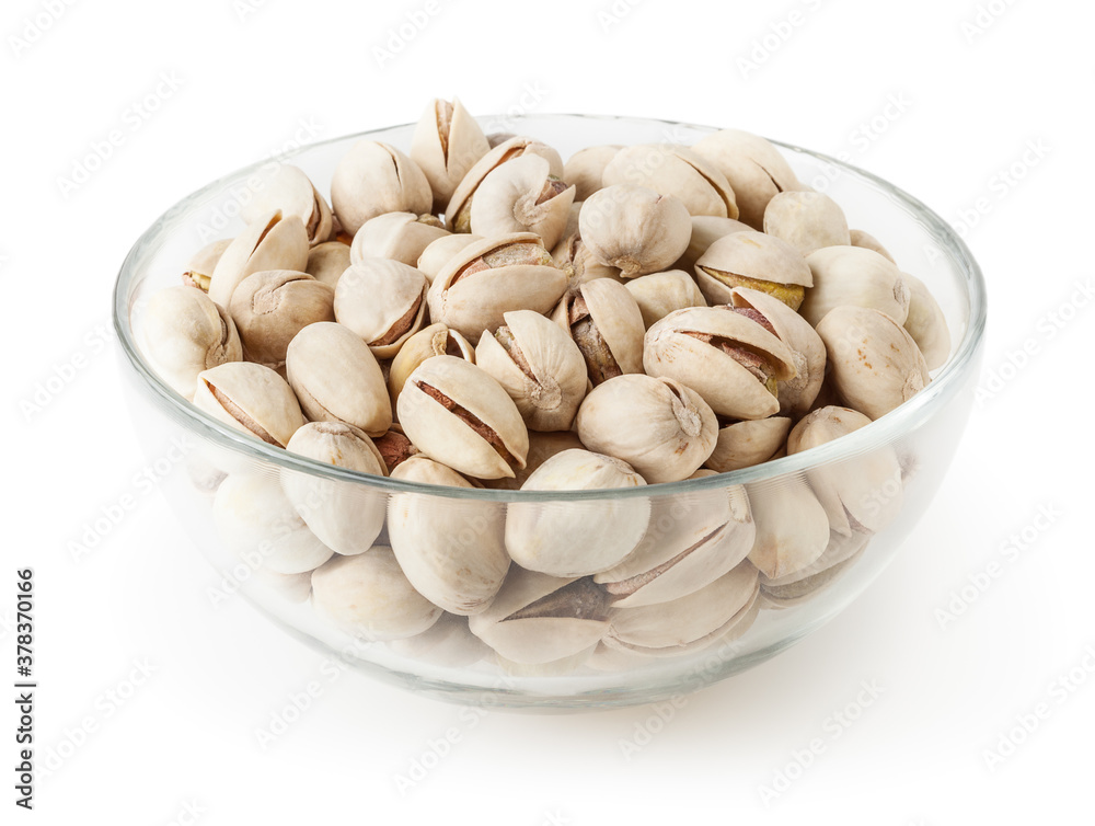 Salted pistachios in glass bowl isolated on white background with clipping path Salted pistachios in glass bowl isolated on white background with clipping path