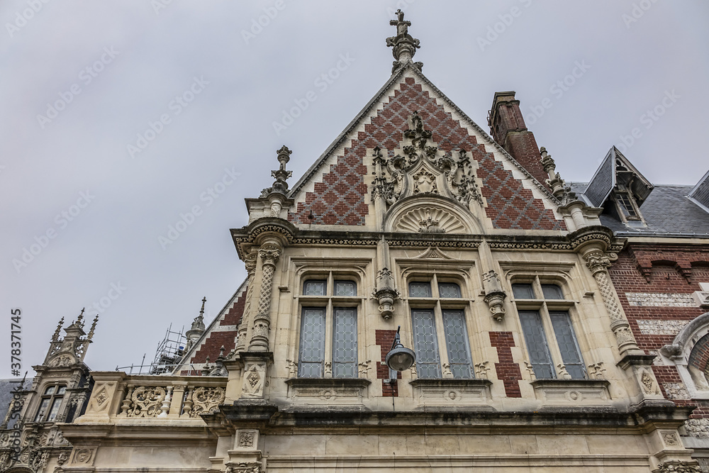 Architectural fragments of Benedictine Palace (Palais de la Benedictine, 1852) - neo-Gothic and neo-renaissance styles chateau. Fecamp, Seine-Maritime department, Haute-Normandie, France. Architectural fragments of Benedictine Palace (Palais de la Benedictine, 1852) - neo-Gothic and neo-renaissance styles chateau. Fecamp, Seine-Maritime department, Haute-Normandie, France.