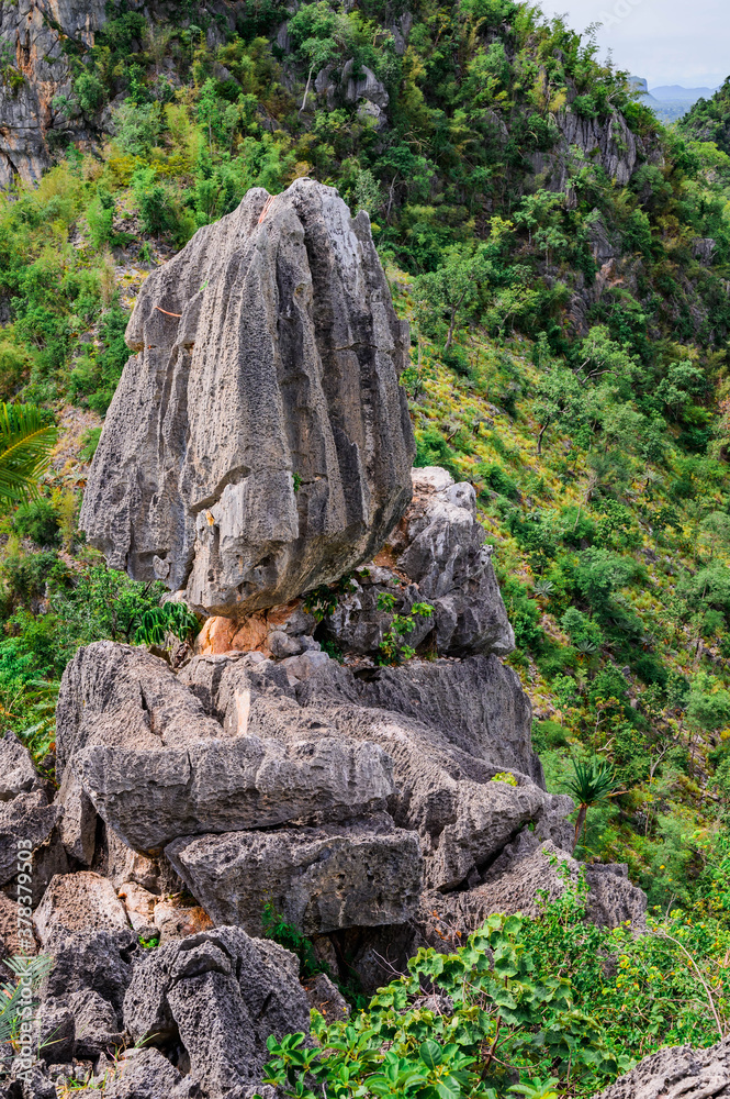 Unseen Thailand of In Kwaen at Khao Chong Sadet Kanchanaburi, A large stone on the top of the mountain Unseen Thailand of In Kwaen at Khao Chong Sadet Kanchanaburi, A large stone on the top of the mountain