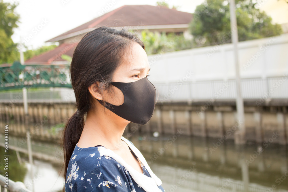 Fototapeta premium girl with black mask