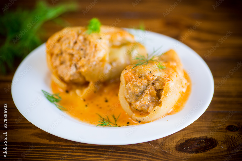 stuffed with meat and rice with roasted pepper sauce stuffed with meat and rice with roasted pepper sauce