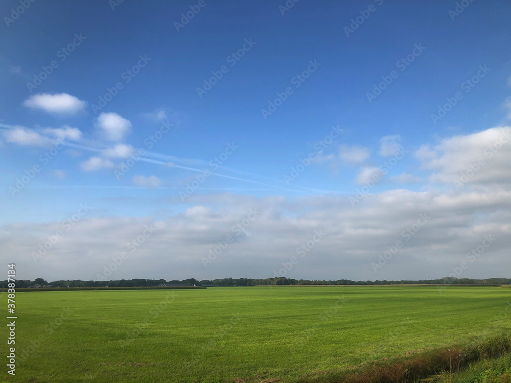 Dutch polder landscapes. Havelte. Oude Vaart. Clouds. Blue sky. Drenthe Netherlands