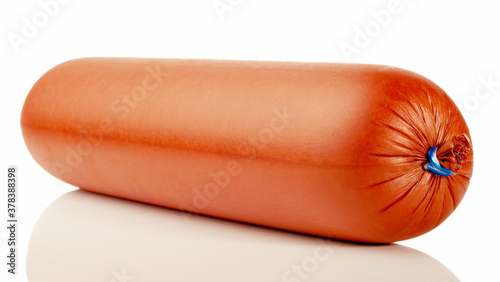 Quadro su tela Whole Lyoner Sausage in Casing - Isolated on white Background
