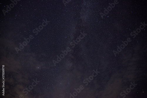 A star at nigh sky with cloudy