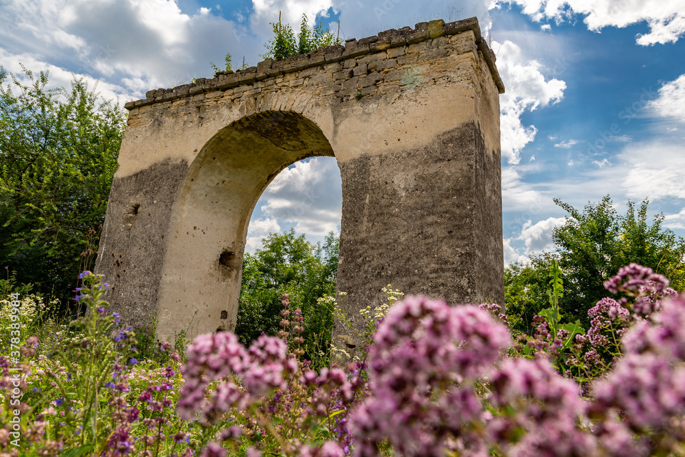 A beautiful arch under the open sky on the territory of the castle..