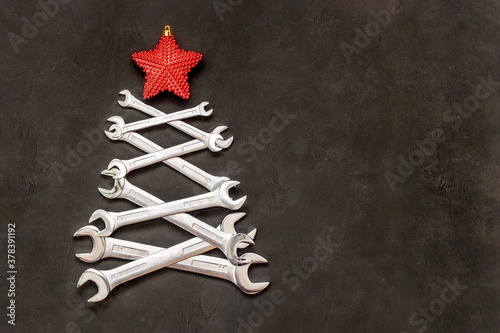 Christmas tree made from steel tools. Happy new year and merry christmas holiday.