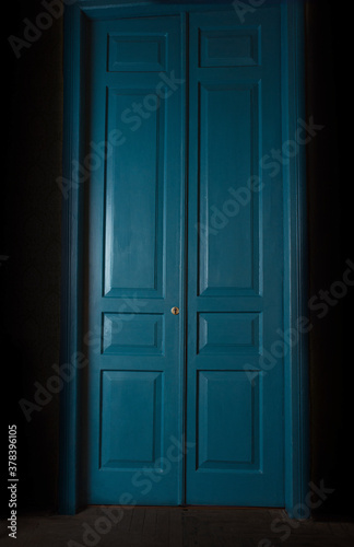 blue massive vintage doors indoor. Old fashioned interior concept 