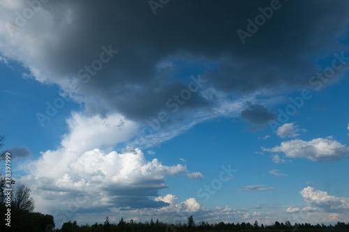 Very beautiful clouds in the blue sky. © Oleg