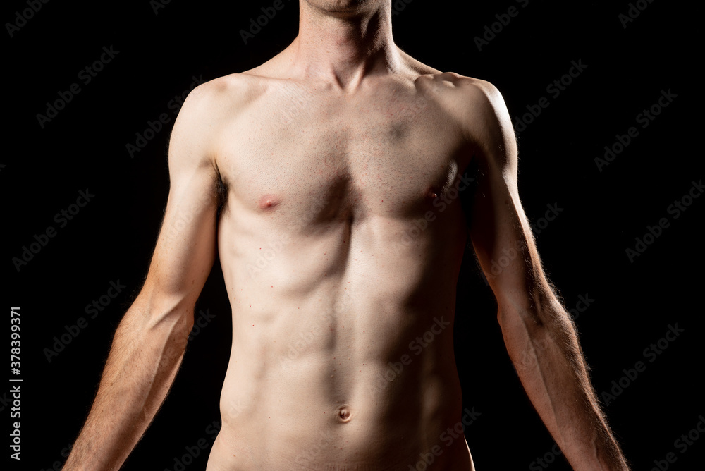 A skinny muskular man with funnel or sunken chest, better known in medicine as Pectus Excavatum. Front view with arms down.