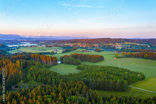 Germany, Bavaria, Upper Bavaria, Tolzer Land, near Eurasburg, Forest andÔøΩBeuerberg in morning light, aerial view photo