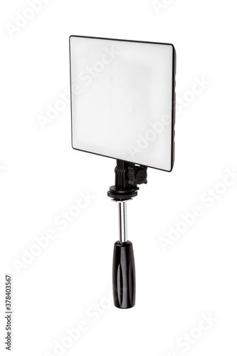 Professional lighting equipment for video production isolated on white. Portable video light for filming video and video blogging. Lighting device for film production.