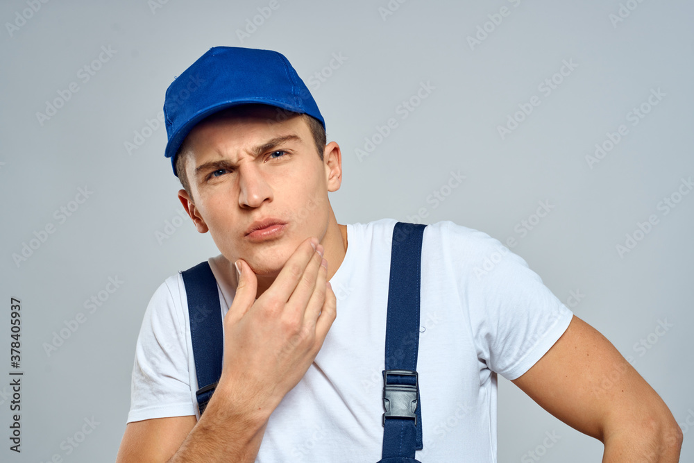 working man in uniform service lifestyle delivery service light background working man in uniform service lifestyle delivery service light background