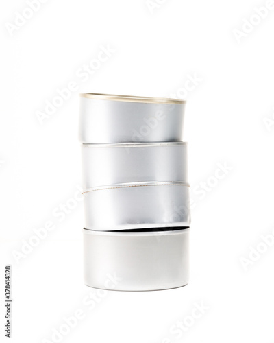Empty food cans for recycling over white background