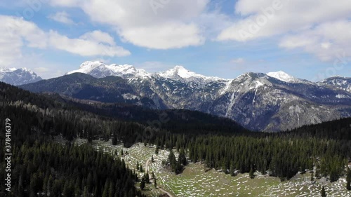 Velika Planina with peak in the background in Slovenia.