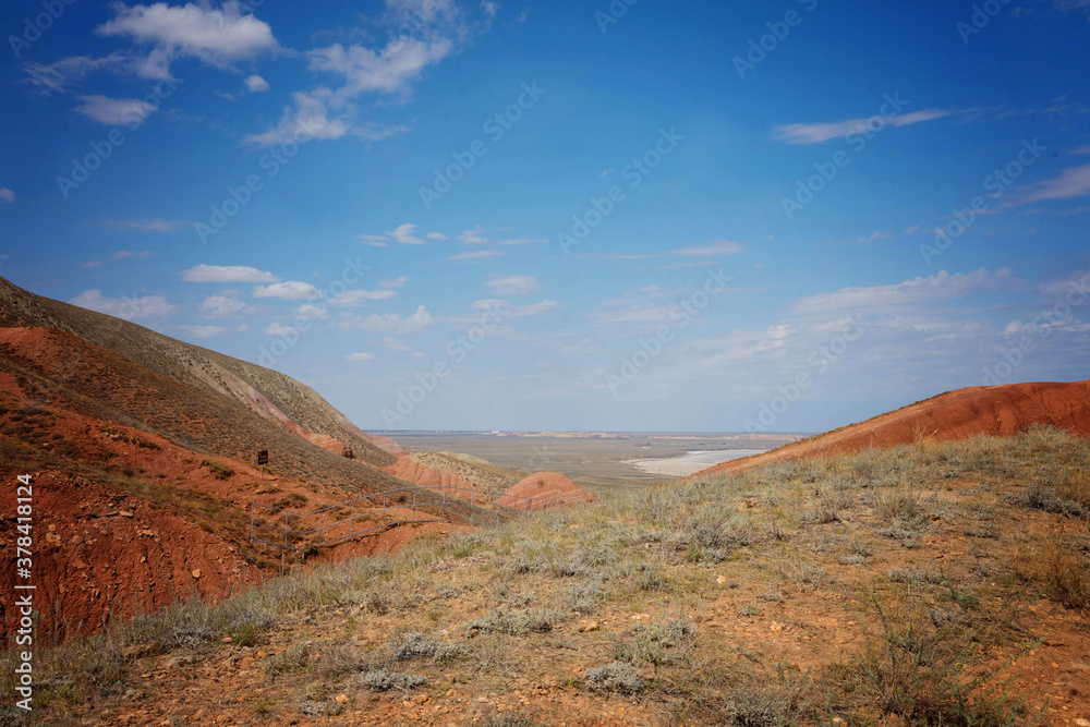 colorful mountains on a background of blue sky