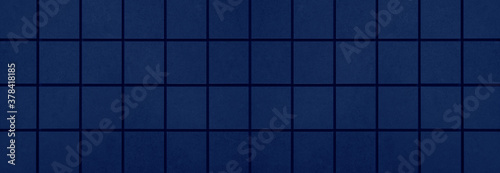 Seamless dark blue colored geometric concrete stone cement mosaic square tile wall texture background banner panorama