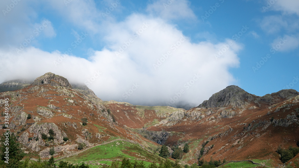 Langdale pikes in autumn under cloud