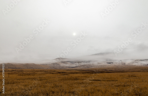 Dreary  foggy  empty  and barren winter landscape at the National Bison Range wildlife refuge  Montana  USA